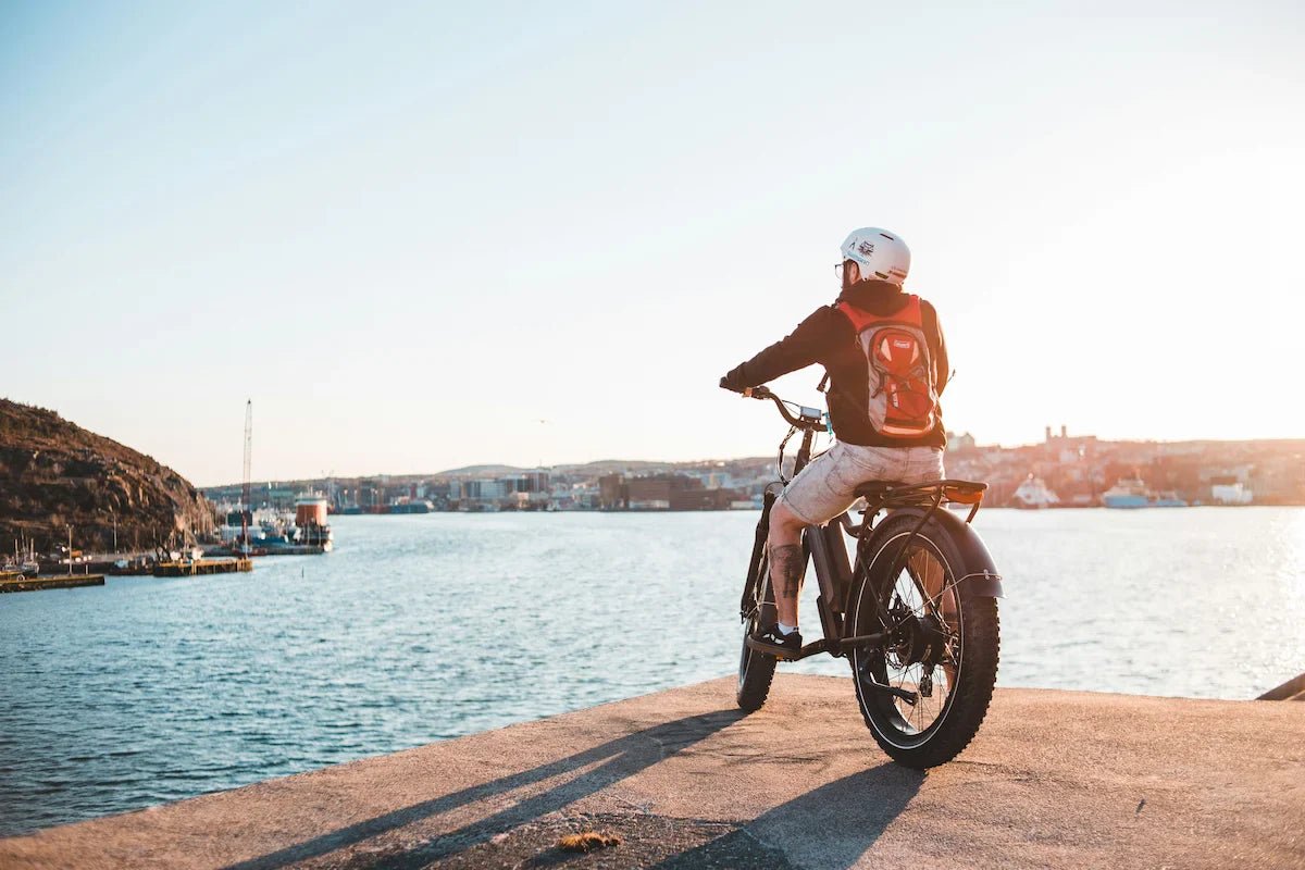 Three fat tyre ebikes on bridge