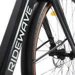 Front wheel and road tyre detail on the Ridewave Glide Road ebike