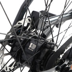Rear hub motor, disc brake and spokes detail on the Ridewave Glide Road electric bike