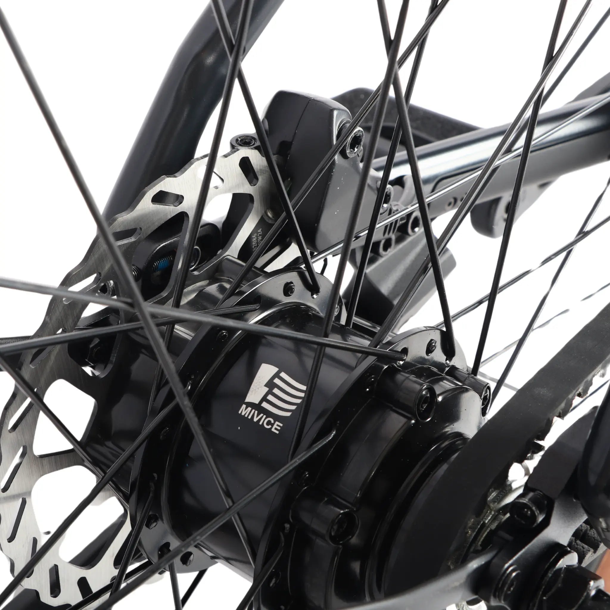 Rear hub motor, disc brake and spokes detail on the Ridewave Glide Road electric bike