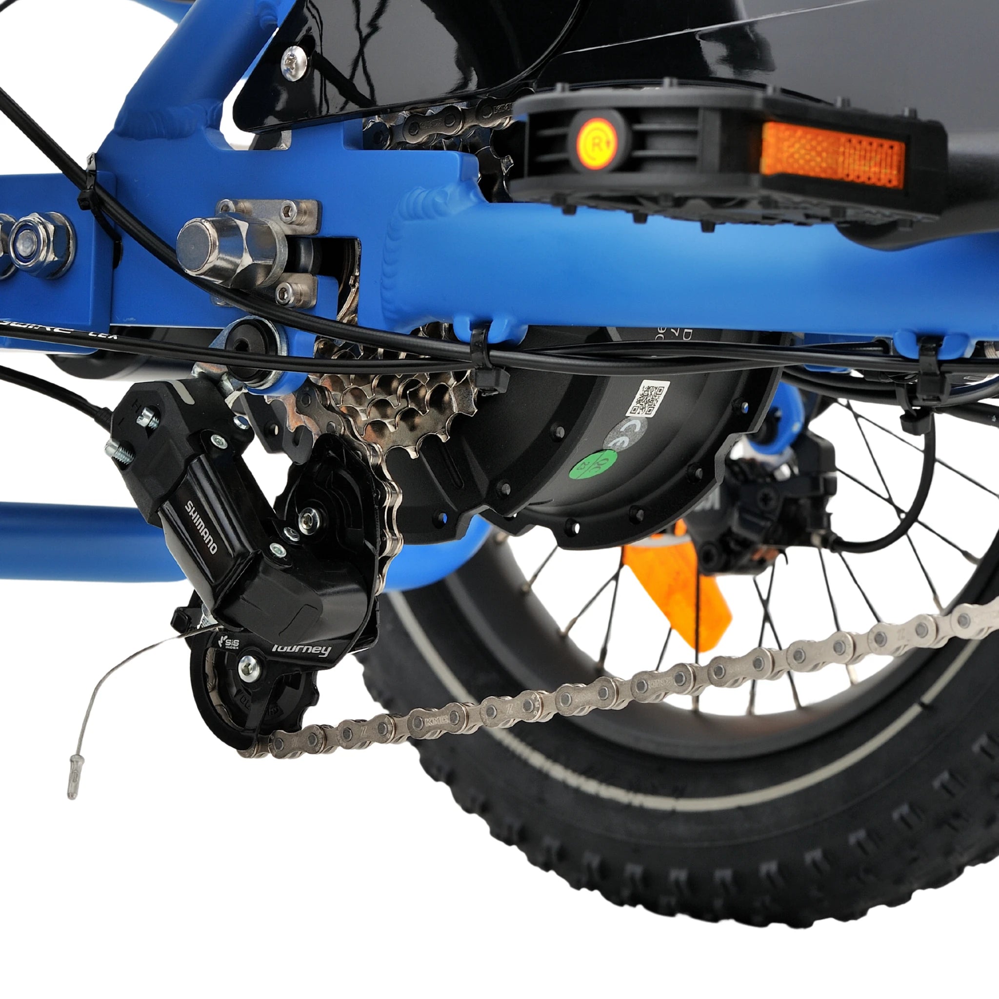 Ridewave Koala sky blue electric trike drivetrain close-up with chain, pedal and rear wheel #color_sky-blue